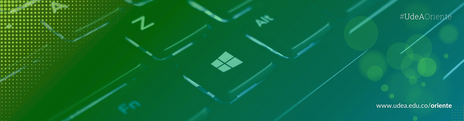 Banner con un plano detalle de un computador portátil