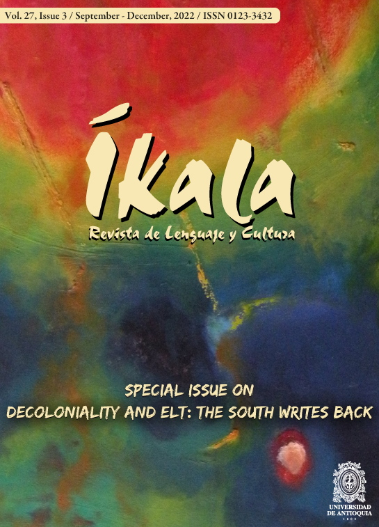 Portada del volumen 27 de la Revista íkala, en la que se fusionan colores como el rojo, amarillo, azul y verde.