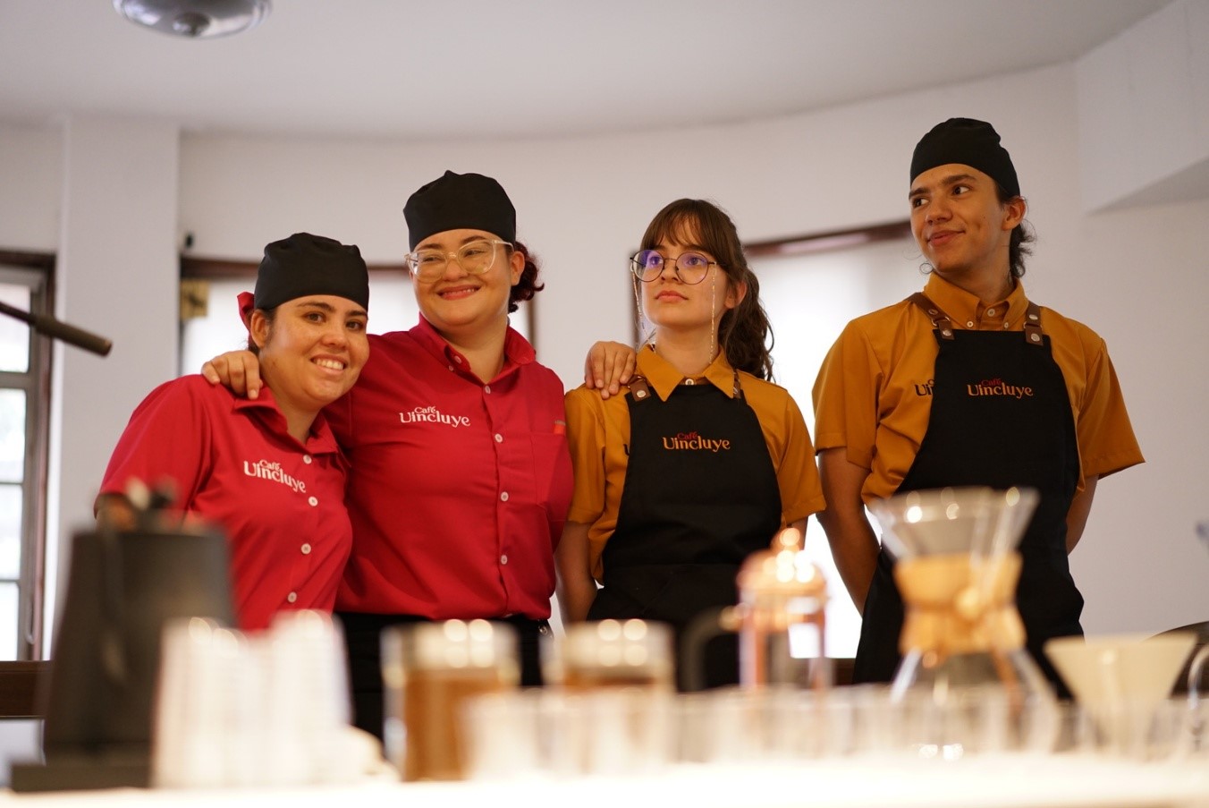 A group of people wearing aprons

AI-generated content may be incorrect.